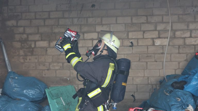 a fireman using thermal camera